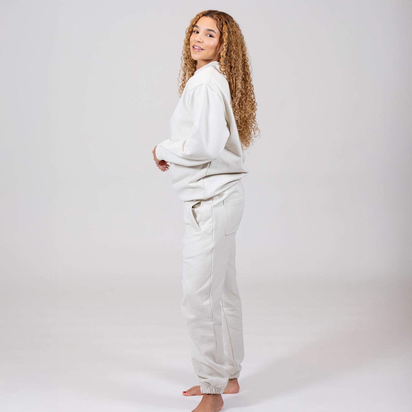 model wearing stone heavyweight joggers side pocket view – Nice Girls Label